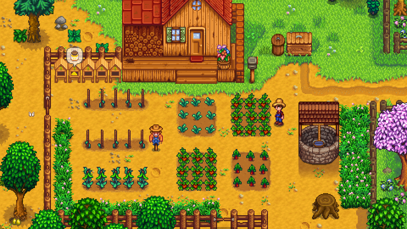 A screenshot of a farm plot in Stardew Valley with the house, some crops, beehives, a well, a scarecrow, and the player character