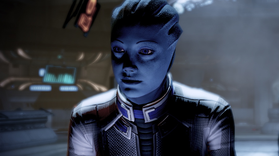 A close up of Liara wearing her Shadow Broker outfit as he faces the camera