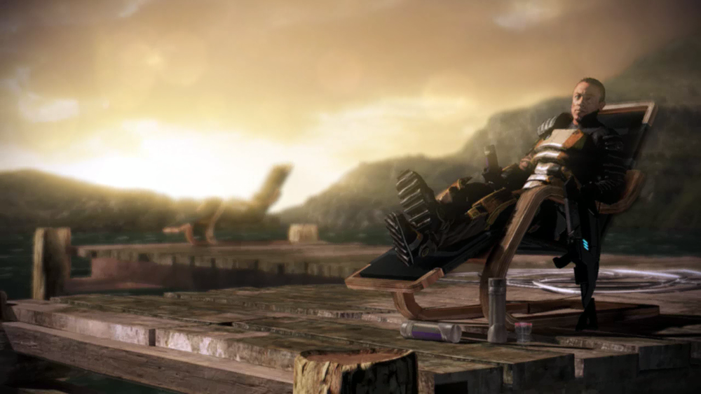 Zaeed facing the camera while reclining in a beach chair with the sun setting behind him