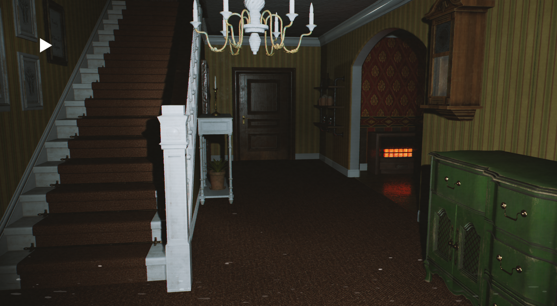 Screenshot of the house from 2000 Navidson lane. You can see a staircase, chandelier, and hallway leading to two other rooms