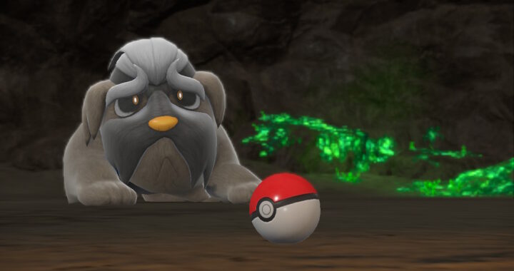 Pokémon Scarlet and Violet screenshot of Mabosstiff lying in a cave with a pokeball