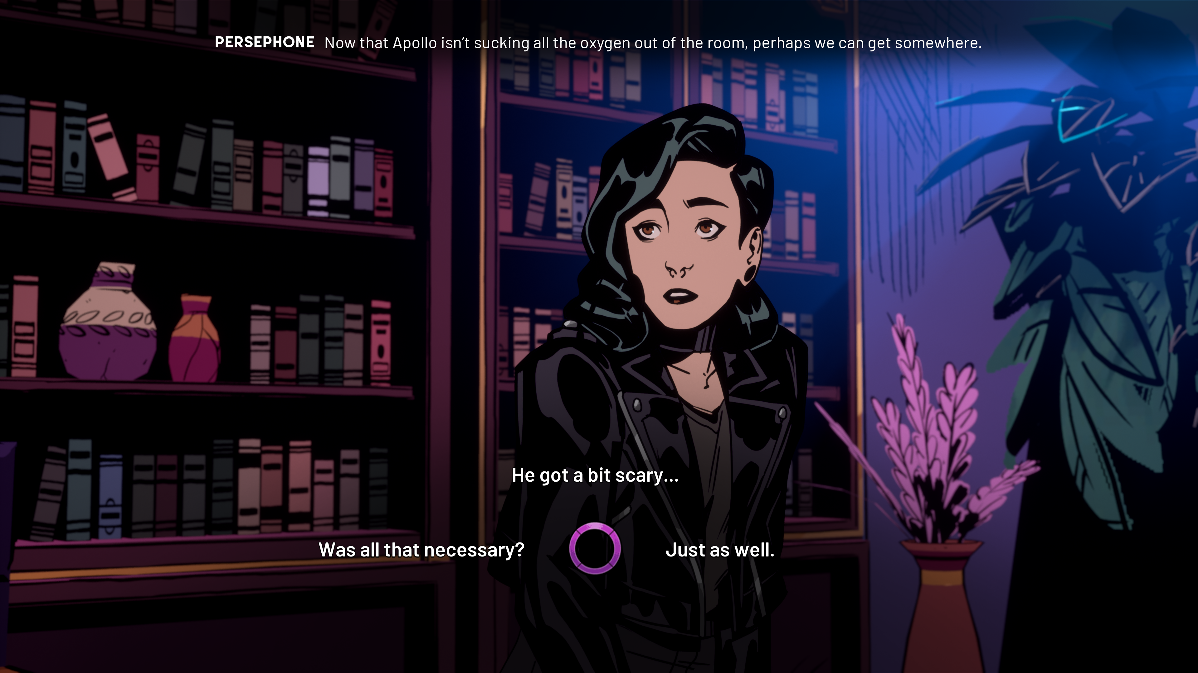 Grace, the protagonist of Stray Gods is sitting on the edge of a desk. She is wearing a black leather jacket, her hair is loose, and she is looking past the camera at Persephone, who is out of frame. There are bookshelves behind her, with some vases and flowers visible. A purple chair is visible. Persephone is speaking, with the subtitle reading “Now that Apollo isn’t sucking all the oxygen out of the room, perhaps we can get somewhere.” The work in progress dialogue wheel at the bottom has three options. To the left it reads ‘Was all that necessary.’ To the right it reads ‘Just as well?’ and the top option reads ‘He got a bit scary…’.